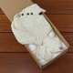 My First Aran Baby Gift Set with hand-knitted cream cable-knit sweater, pom-pom hat, and matching mittens—crafted from soft merino wool and beautifully boxed for newborn gifting, christenings, or baby showers. My First Aran Baby Gift Set with hand-knitted cream cable-knit sweater, pom-pom hat, and matching mittens—crafted from soft merino wool and beautifully boxed for newborn gifting, christenings, or baby showers.